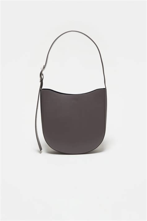 half circle grey bag.